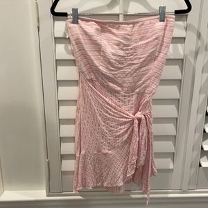 A pink strapless dress from a local boutique